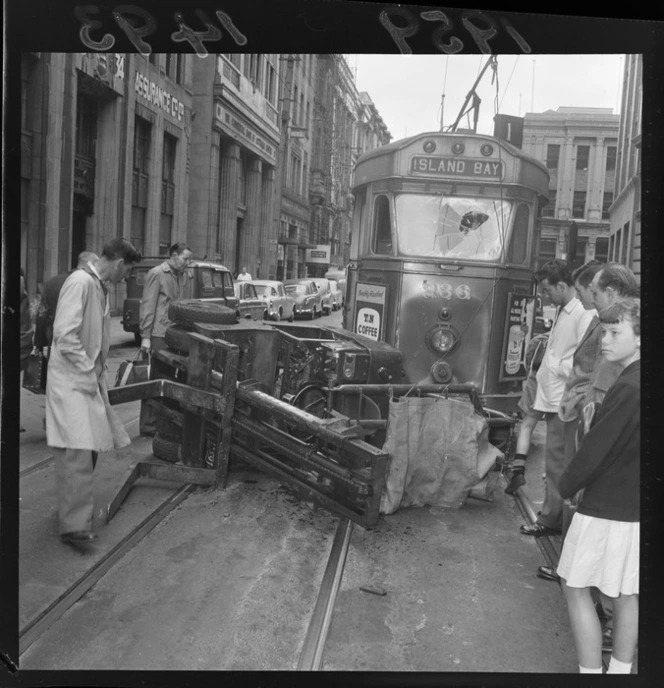 1959 - tram vs forklift, near waterfront? forklift capsized; No injury details.